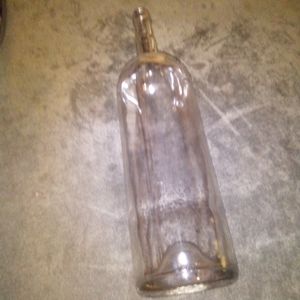 Antique Royal Crown liquor embossed tall bottle
